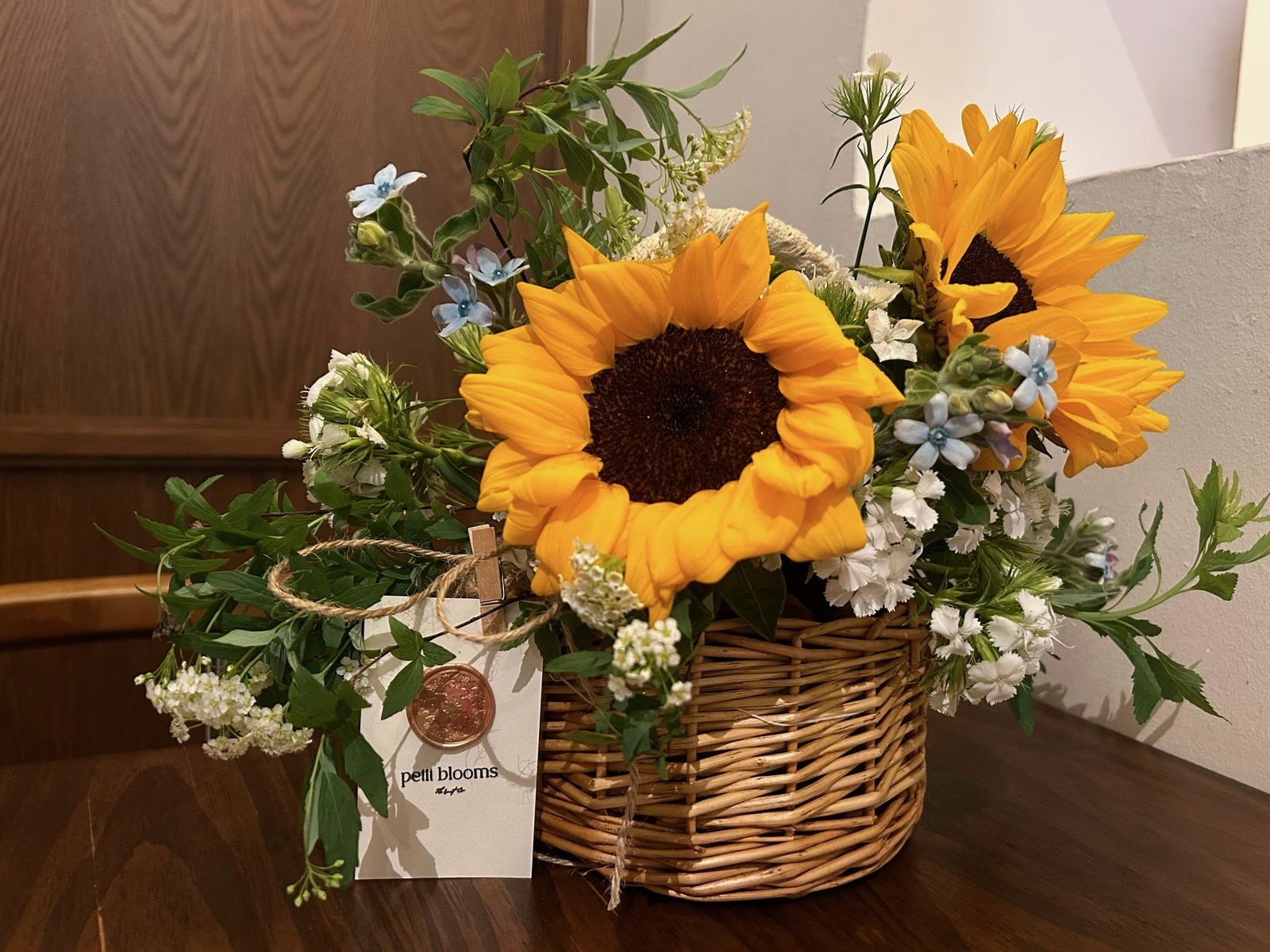 Bouquets wrapped in kraft paper, prepared for donation